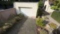 Garage mit Stellplatz